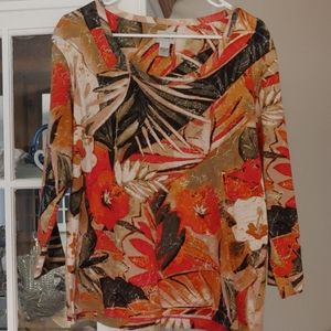 Nice design blouse looks very tropical.